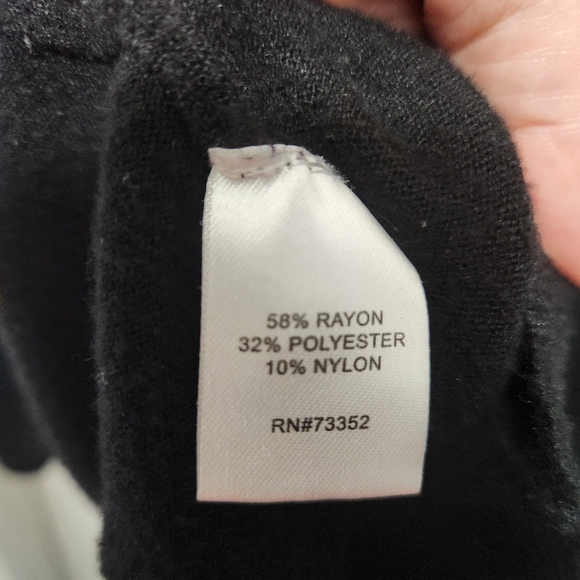 Chic Black Sweater with Cross Back Detail - Picture 4 of 4